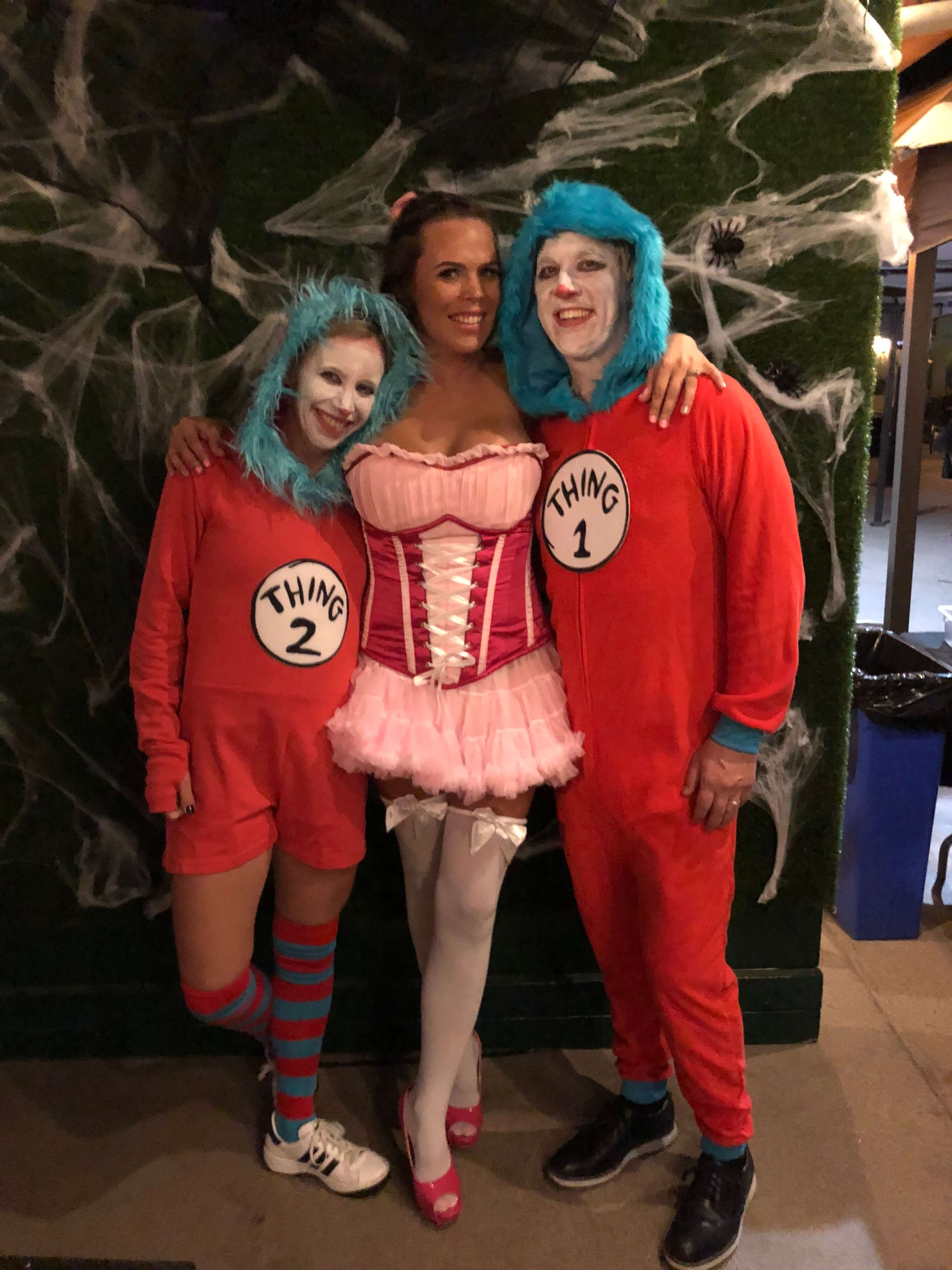 Three people in Halloween constumes