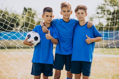 comp_football-team-players-field-min (1)