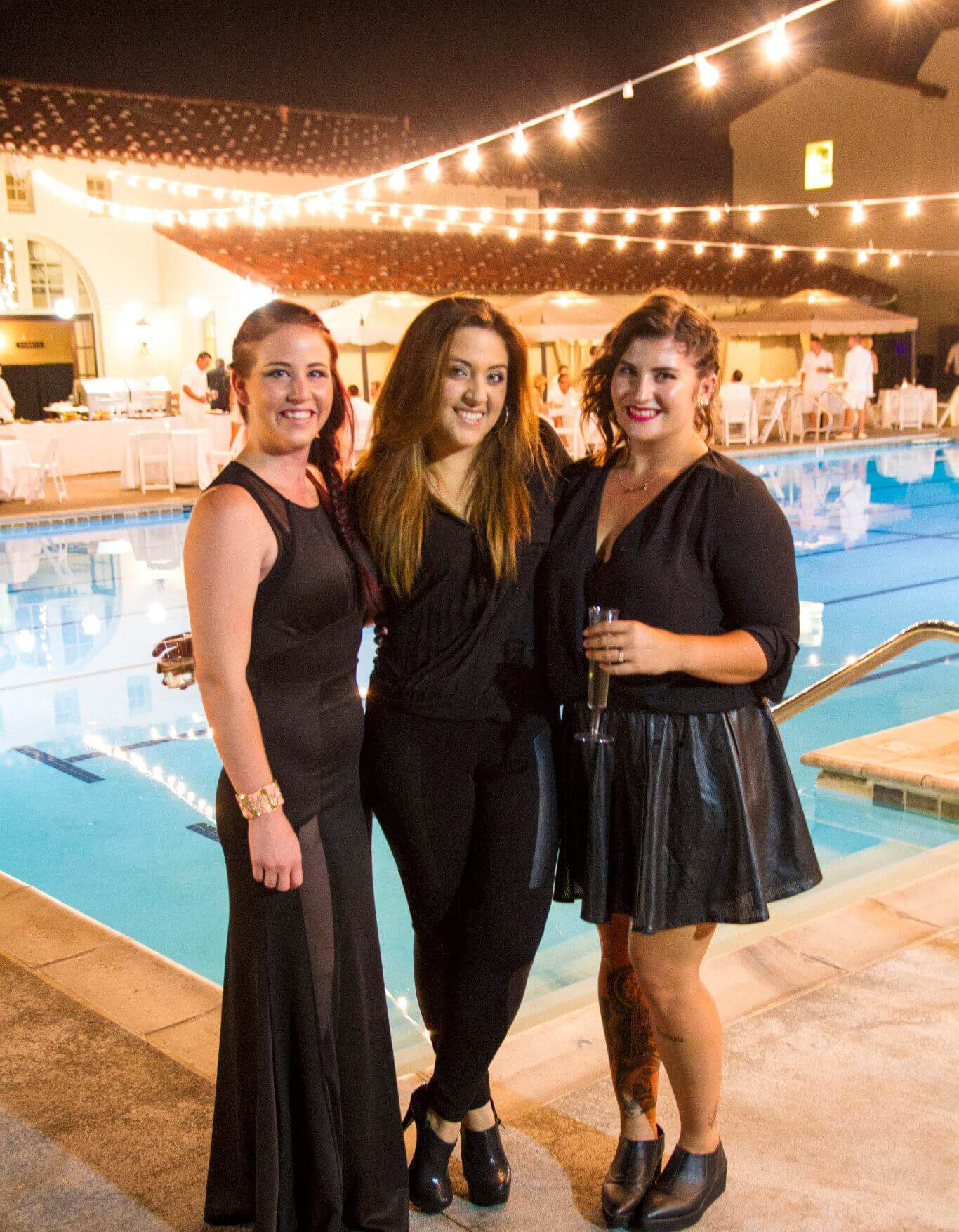 three women in black